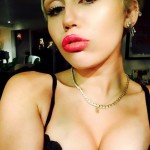 Miley Cyrus lips and breast augmentation